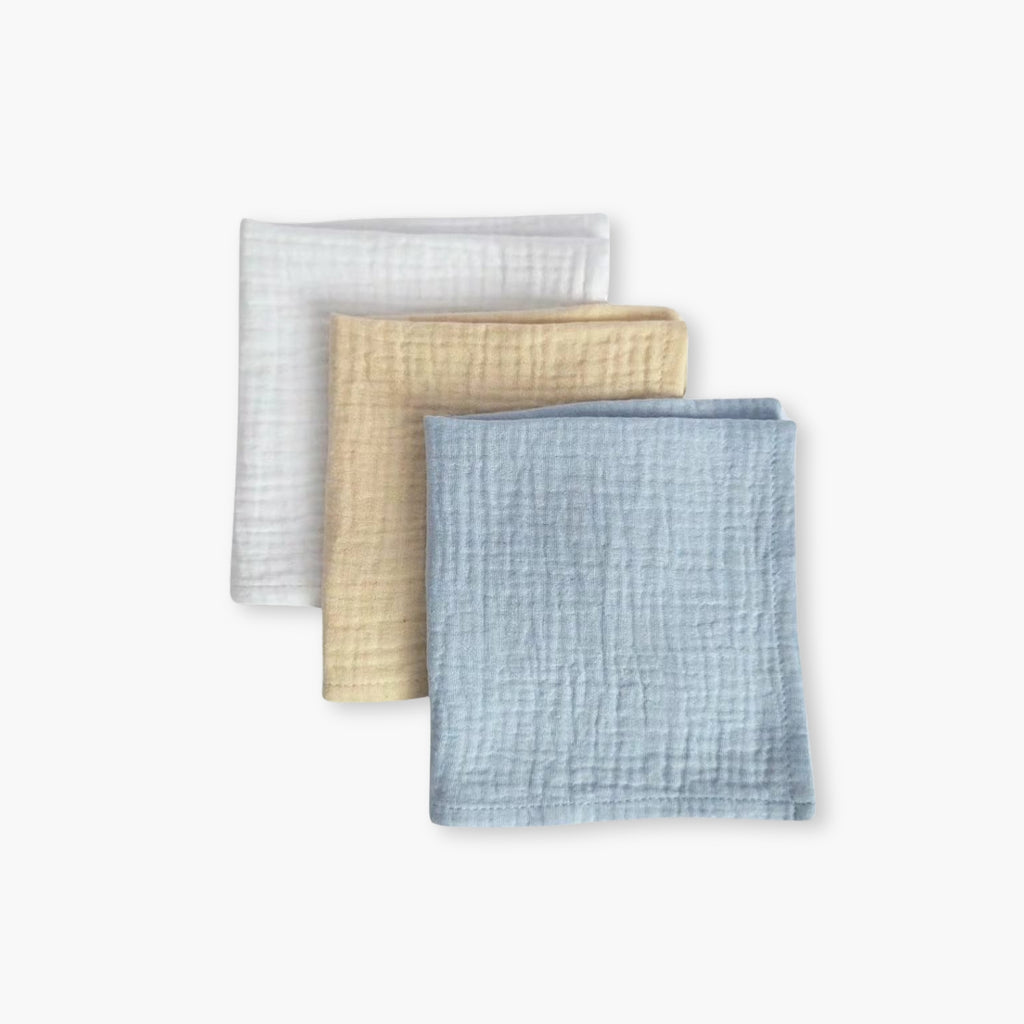 Set 3 prosoape muselina 25x25 pentru bebelusi in nuante albastru, crem si alb